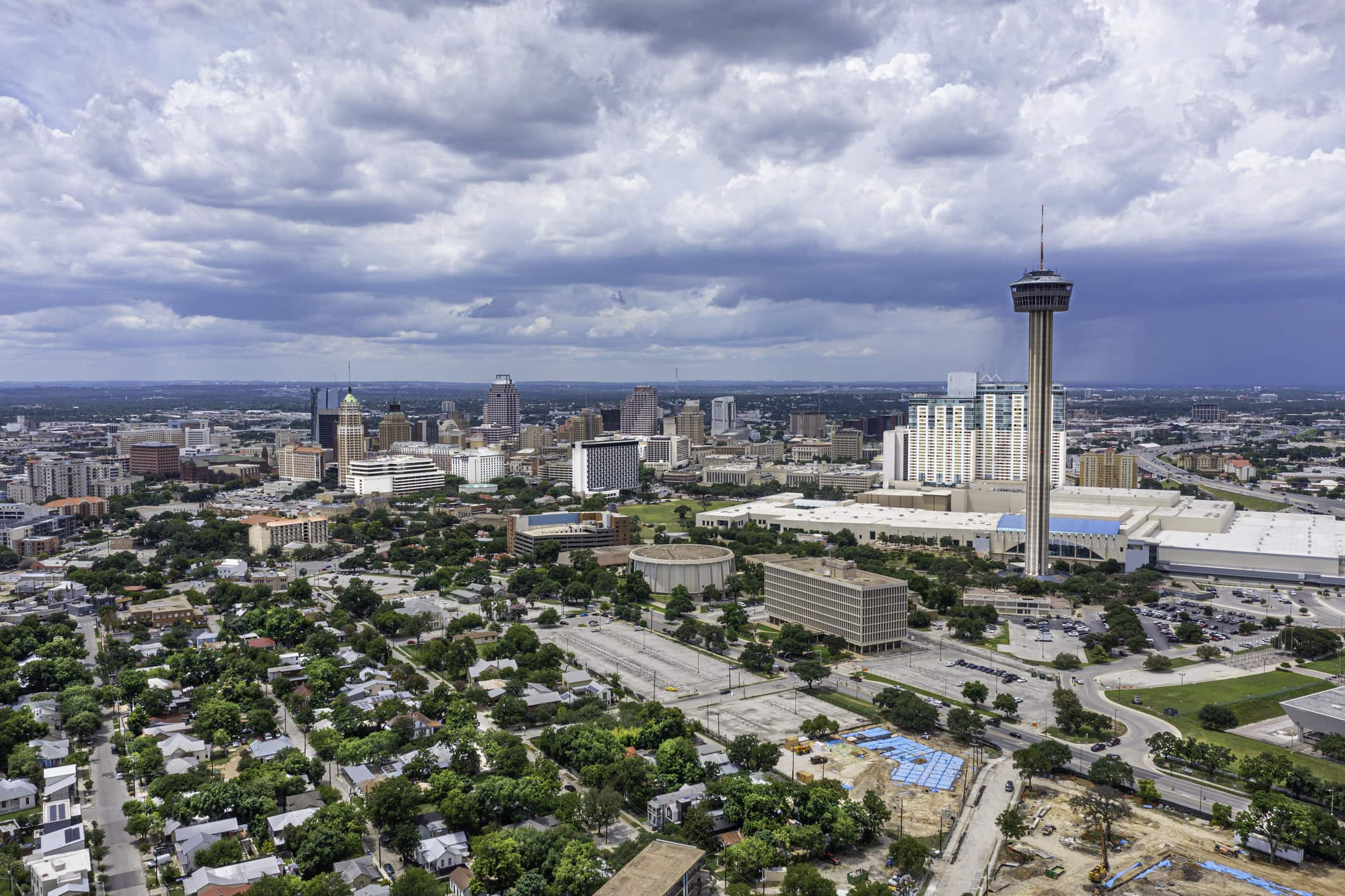 Drone angle view of San Antonio with afternoon thunderstorm